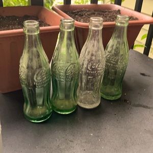 Antique Coca Cola glass bottles from the 60’s